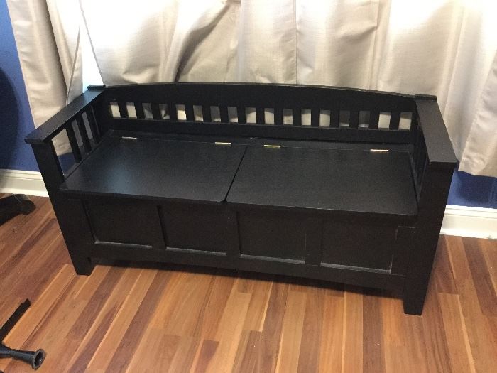Black bench with lift up seats for great storage!