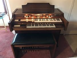 Gulbransen Paragon Organ with bench and lots of sheet music for organ lessons.