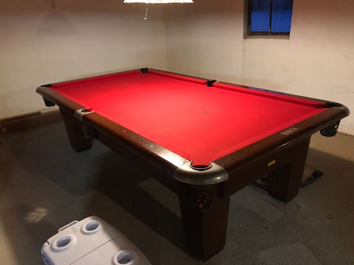 Brunswick pool table. 9’5” x 5’3” slate table (3 piece) 
Sturdy and level table. Very good condition. 