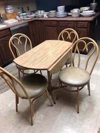 Darling drop leaf table and four metal ice cream chairs