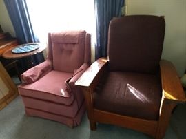 Wooden chair is Mission style by Sam Morris. Solid wood with wild cherry finish. 