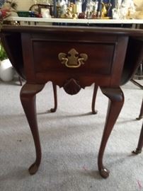 Wooden table with  drop leaves