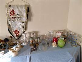 candle holders, pitchers and table runner with place matts