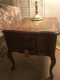 French provincial end table; leather top, 2 drawers