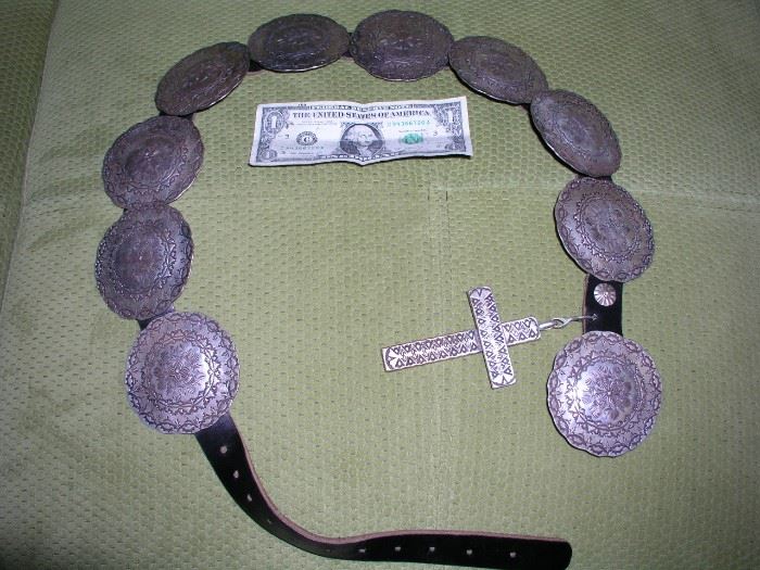 Incredible sterling concho belt by W.R. Harris. Medallions are approx. 52g each, cross is 125g. 