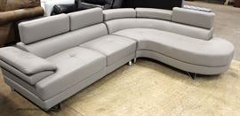 NEW Contemporary Grey Leather 2 Piece Sofa with Circular Chaise – auction estimate $300-$600 