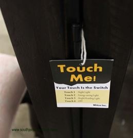 NEW Contemporary Mahogany Finish 4 Door Credenza with Touch Me Lights and Tags – auction estimate $200-$400 