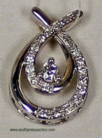 10 Karat White Gold Pendant with approximately .25 Diamonds – auction estimate $200-$400 