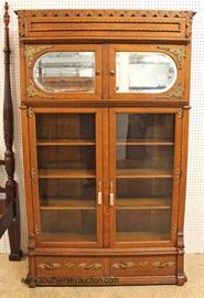 ANTIQUE Oak 2 Door Bookcase with Mirror Top Doors in the Original Finish – auction estimate $400-$800 
