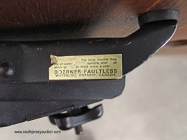 Mid Century Modern Laminated Rosewood Eames Style Chair and Ottoman by “Doerner Faultless” – auction estimate $400-$800 