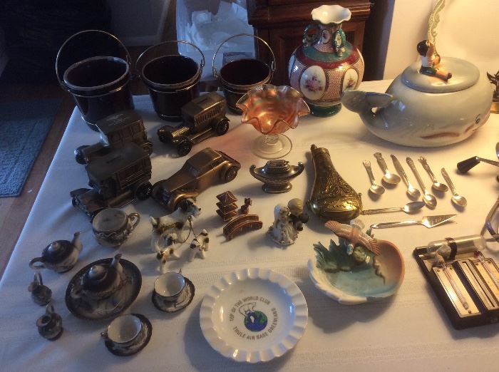Vintage toy car banks. Black powder flask. Miscellaneous collectibles
