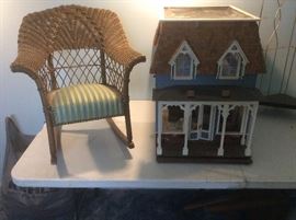 Old child’s rocker and wood doll house