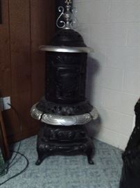 ANTIQUE PARLOR STOVE. $395.00