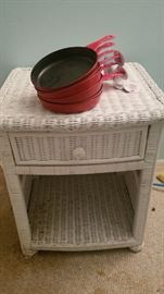 Wicker nightstand and small Teflon skillets - I think she used these to melt crayons into shapes for her students. 