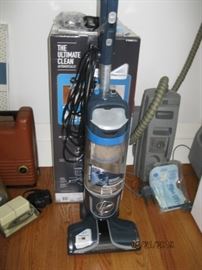 Like new Hoover Upright, original box, accessories, and book