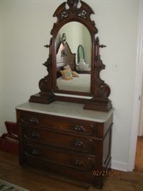 Renaisannce Revival Marble Top Dresser with arched mirror, glove boxes and a hidden drawer