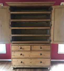 Antique English linen press with pull out shelves