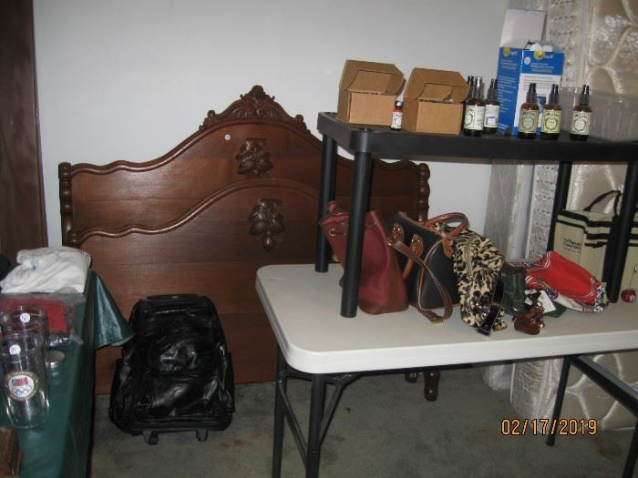 Full size bed, leather travel case, essence oil and purses.