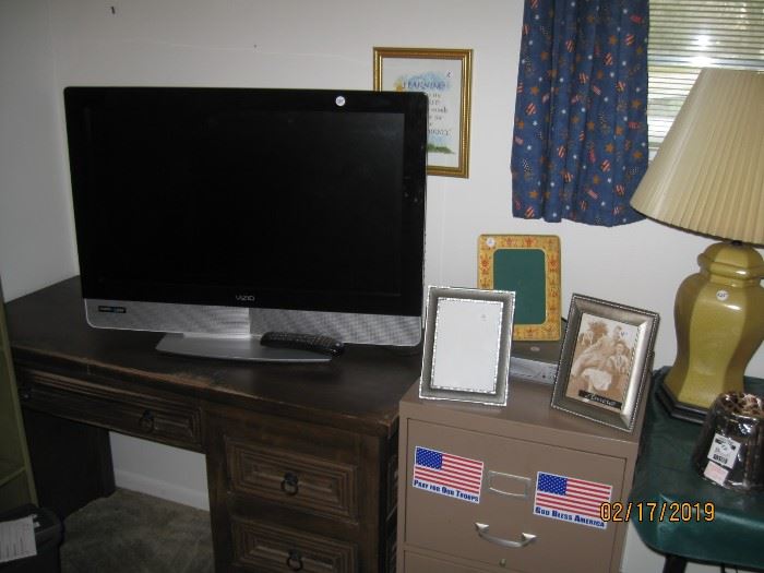 32" tv and DVD player.  Desk and file cabinet not for sale.