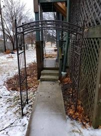 Metal awning and pieces in yard