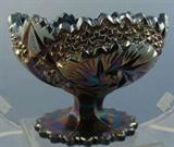 Gorgeous Fenton Pinwheel Pattern Amethyst Carnival Glass Compote.
Condition:Very Good
Size:5" x 6 1/2"
Shipping:Yes