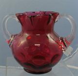 Red Glass double handled Urn. Ruffled rim, clear blended handles and large thumbprint sides accent this piece.
Condition:Very Good
Size:10"
Shipping:Yes