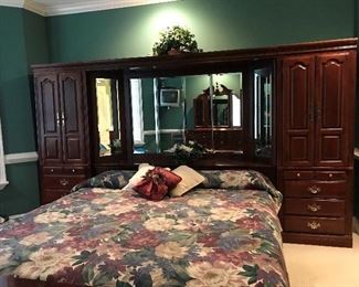 King size wall unit bed, measures 11' 4 1/4"Wx6' 5"H. So much storage!! You will love this....see more pictures for matching king size dresser with hidden jewelry storage/display.