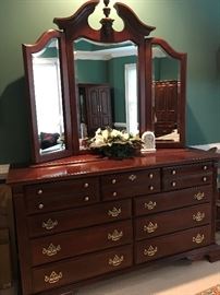 Matching king size dresser, measures 64.5"Lx21"Dx88"H, with hidden jewelry storage behind mirror...you will love it!