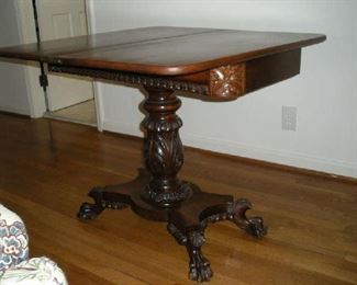 Landing-Second Floor: The flip-top table is now flipped open and rotated to create a game table.