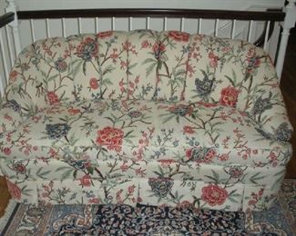 Landing-Second Floor:  A channel back settee with crewel upholstery measures 66" wide with a 34" tall back. 