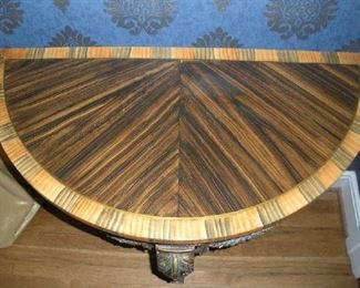 Living Room:  This is view of the interesting painted top of the demi-lune table. 