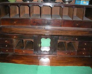 Living Room:  Here is a closer view of he interior pigeon holes and sets of drawers.              Shhh....the center mirrored section with small door has a secret compartment!
