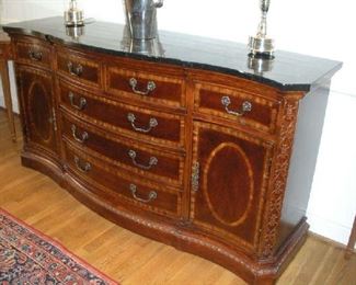 Dining Room: This elegant sideboard has a black marble top, seven drawers and two side doors, which give you lots of storage!  It measures 72" wide x 20" deep  x 36" tall.  