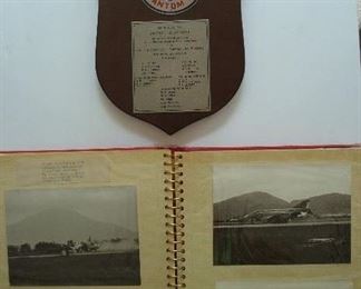 Collectibles-in Kitchen:   This plague and photo album are sold as a SET.  The photo album includes numerous black/white photos of Sandy McDonnell's
visit to Viet Nam, including DaNang and Saigon.
He wrote descriptions under many of the photos.
The plaque was presented to Sandy McDonnell on the occasion of his visit to the "Phantom Bases
in South East Asia" from the McDonnell Phantom Tigers. 
