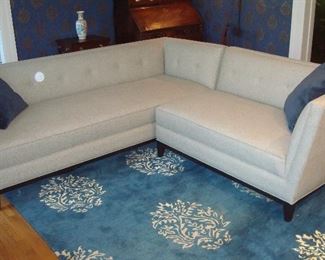Living Room:  This sectional was brought up from the lower level to make it easier for the buyer of this beautiful two-piece contemporary item to move it upon purchase.  The longer piece has two arms and measures 7'  10" long; the shorter piece has one arm and measures 4' 10" wide.  The blue/tan floral rug coordinates well with the sectional.  It measures 7'  8"  x 10'  10."