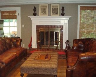 Family Room:  Two identical LEXINGTON leather Chesterfield-style sofas face a custom made leopard ottoman.  Closer photos follow.  