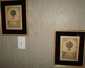 Family Room:  These are two of four available antique reverse-painted hot air balloon scenes.  Each one is priced individually and measures 10" wide X 12-1/2" tall.