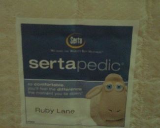 Bedroom #3-Upstairs:  The twin mattress set on the left bed is a SERTA-PEDIC.