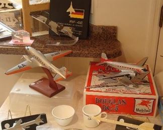 Collectibles in Kitchen:  Phantom II - RF-4E/Germany (includes associated book); Douglas DC-3 - Scale 172/American Airlines Flagship; Douglas DC-3 "The Flying Red Horse" (includes Box); Sparrow (Raytheon); Aim-9L Sidewinder (Raytheon); and a 7-piece set of McDonnell-Douglas Corning (5 pieces are still in original wrap--never opened).
