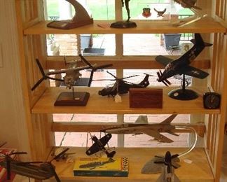 Collectibles in Kitchen:  Super 83; Art Deco bronzed nude (closer photo coming up); F-15 Eagle; CV-22A Osprey-Tilt Rotor Aircraft; U.S Army Helicopter;
Douglas A2D Skylark; DC-10 (small); Douglas SBD5 (Includes Box);  a U.S. Air Force FH-105 Republic Thunder Chief.  On the table are: MH-476E Chinook Long Range Special Operations Aircraft (SOA) for U.S. 106th Aviation Regime; two military knives (closer photo coming up); and a XFY-1 VTO "Pogo."
