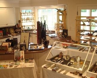 The kitchen has been staged as the memorabilia/collectibles room.  This is an over-view of over 30 McDonnell-Douglas airplane, helicopter, and space craft models; books; photos; and historical items; as well as sterling, carved bone, and many other items.  Numerous closer photos are coming up!