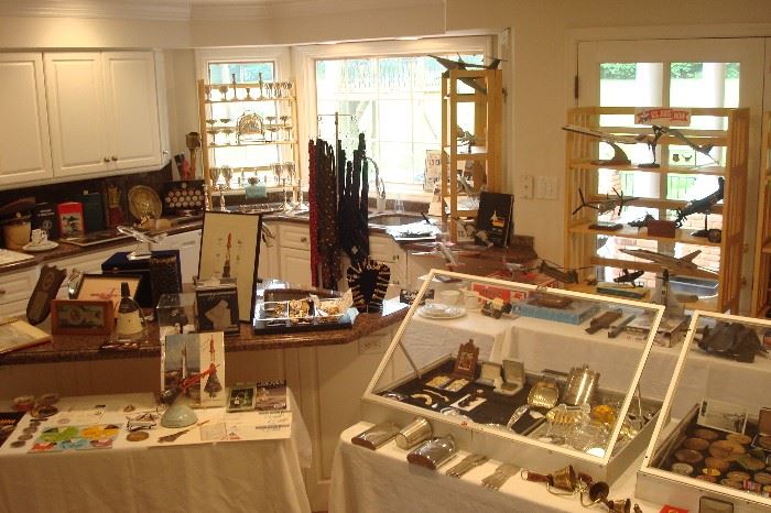The kitchen has been staged as the memorabilia/collectibles room.  This is an over-view of over 30 McDonnell-Douglas airplane, helicopter, and space craft models; books; photos; and historical items; as well as sterling, carved bone, and many other items.  Numerous closer photos are coming up!