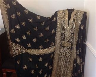 Dining Room:  The right "sleeve" of the gown is now extended to show you the size of this piece.