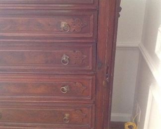 Master Bedroom-First Floor:  Now you can see the long narrow hinged panel on the right side of the English "Wellington Chest" when the panel is opened.