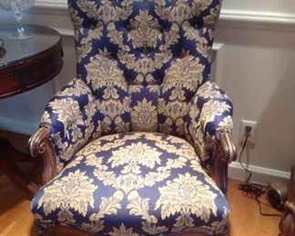 Master Bedroom-First Floor:  This is one of two vintage chairs on casters.  The rich deep blue and gold upholstery has some tufting on the chair back as well as nail head trim.  Each chair is priced separately.