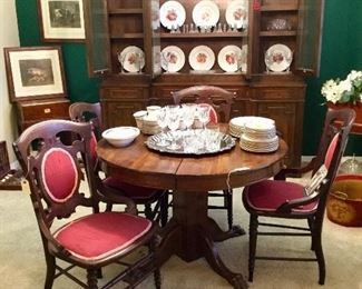 Dining room hutch/ cabinet with West German dishes, pedestal table and antique chairs, Waterford, Royal Doulton china, antique engravings