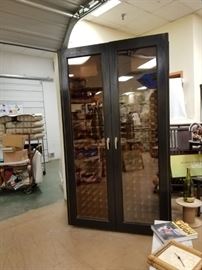Custom built restaurant grade Vinotemp refrigerated wine cabinet has two compressors holds over 450 bottles used only 3 years 
88"H x 50"D x 30"W