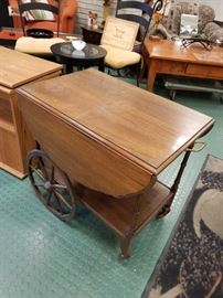 Antique solid wood tea cart on wheels drop top