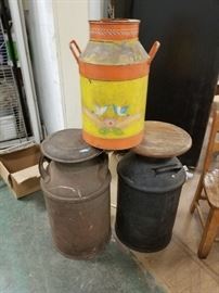 Assorted milk cans