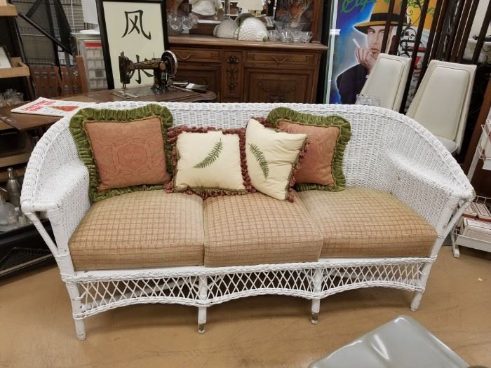 Upscale White wicker / rattan sofa with cushions and pillows
